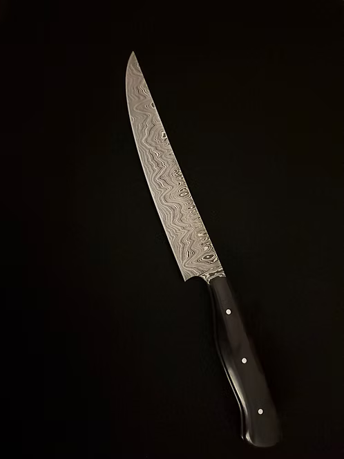 Curran Blades African Blackwood Damascus porcování 7"